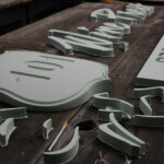 Foam letters and shapes on wood signage