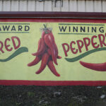 Unique mural of red peppers from our custom sign makers