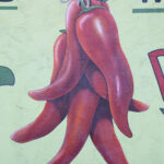 Unique mural of hanging red peppers