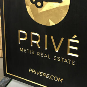 A real estate sign with a modern san serif font