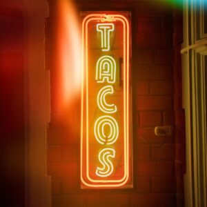 LED sign reading "Tacos"